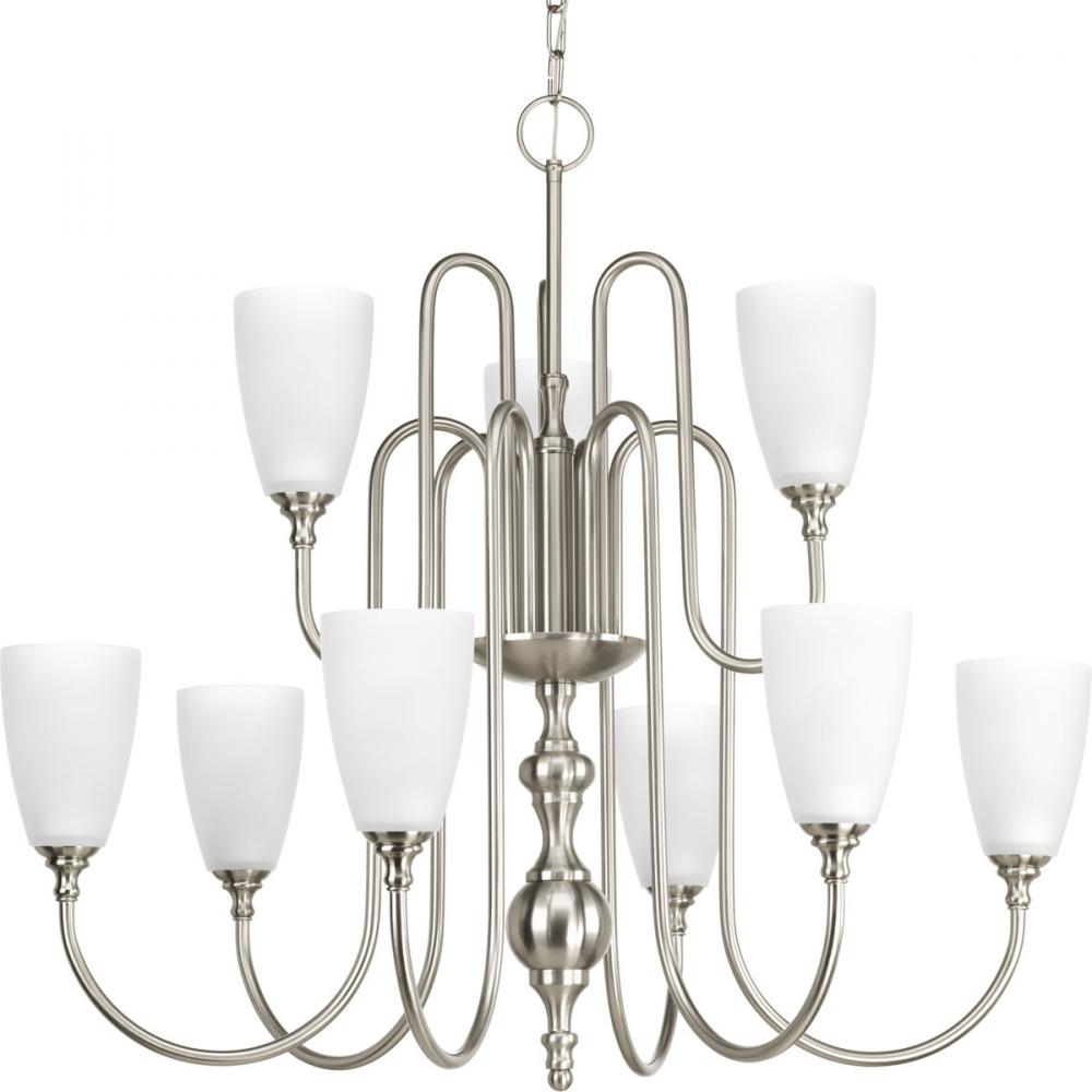 Nine-light, two-tier chandelier finished in brushed nickel with etched glass.